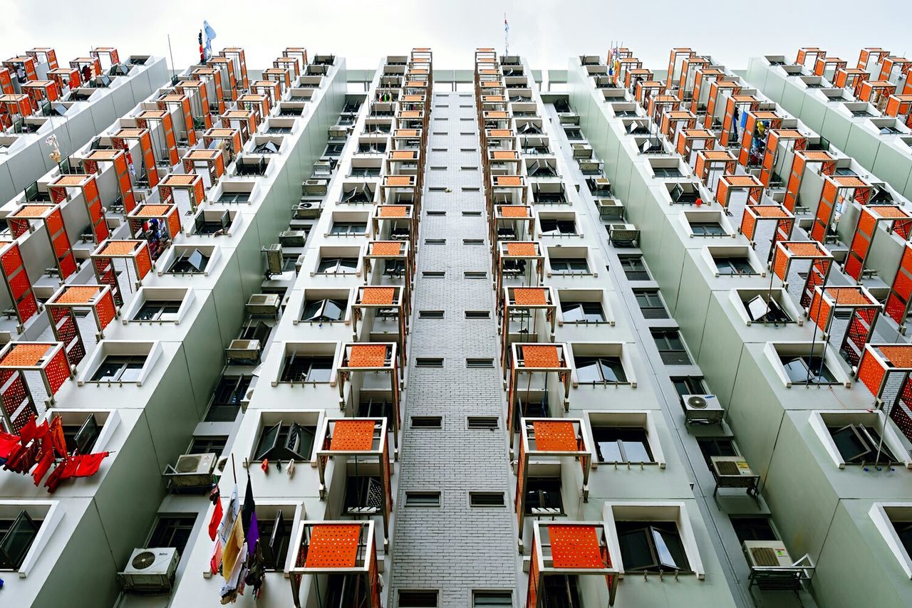 Low angle view of tall building against the sky