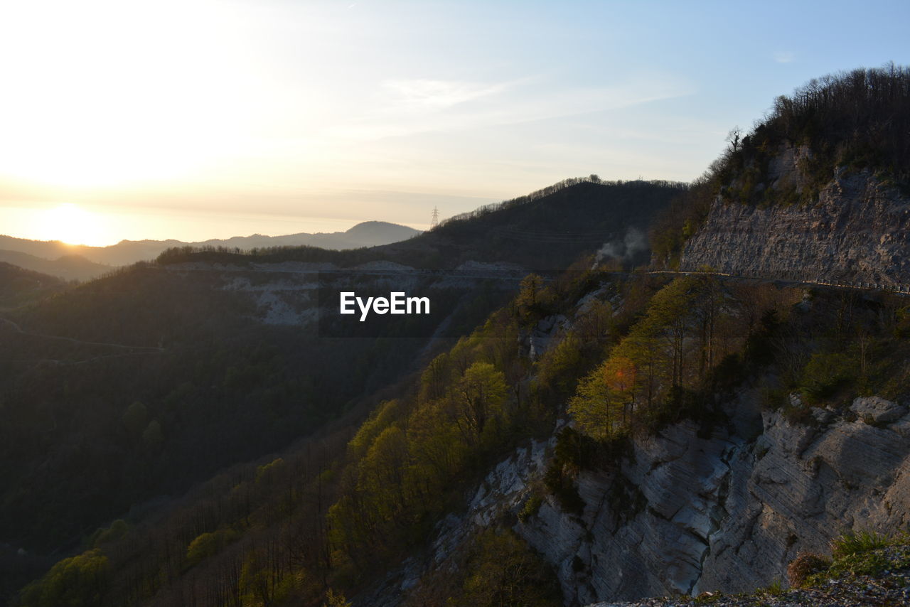 Scenic view of landscape against sky during sunset