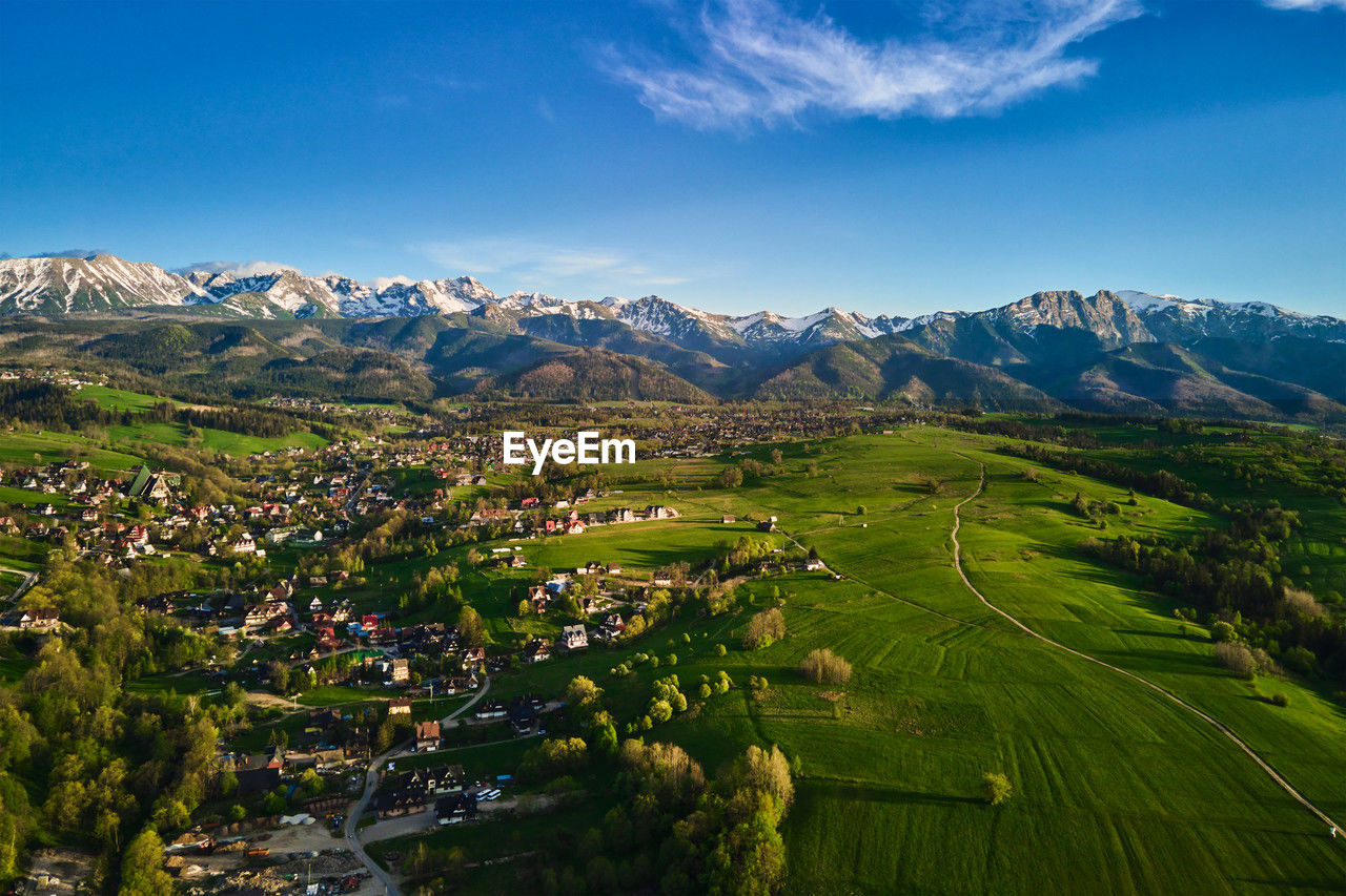 Aerial view of tatra mountains and zakopane town at sunset