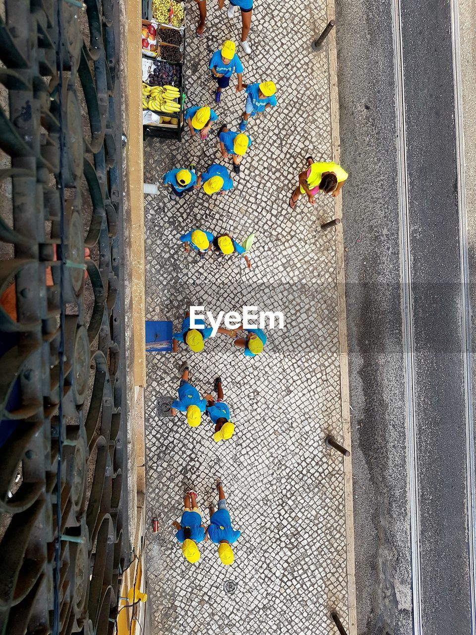 Directly above shot of people on sidewalk