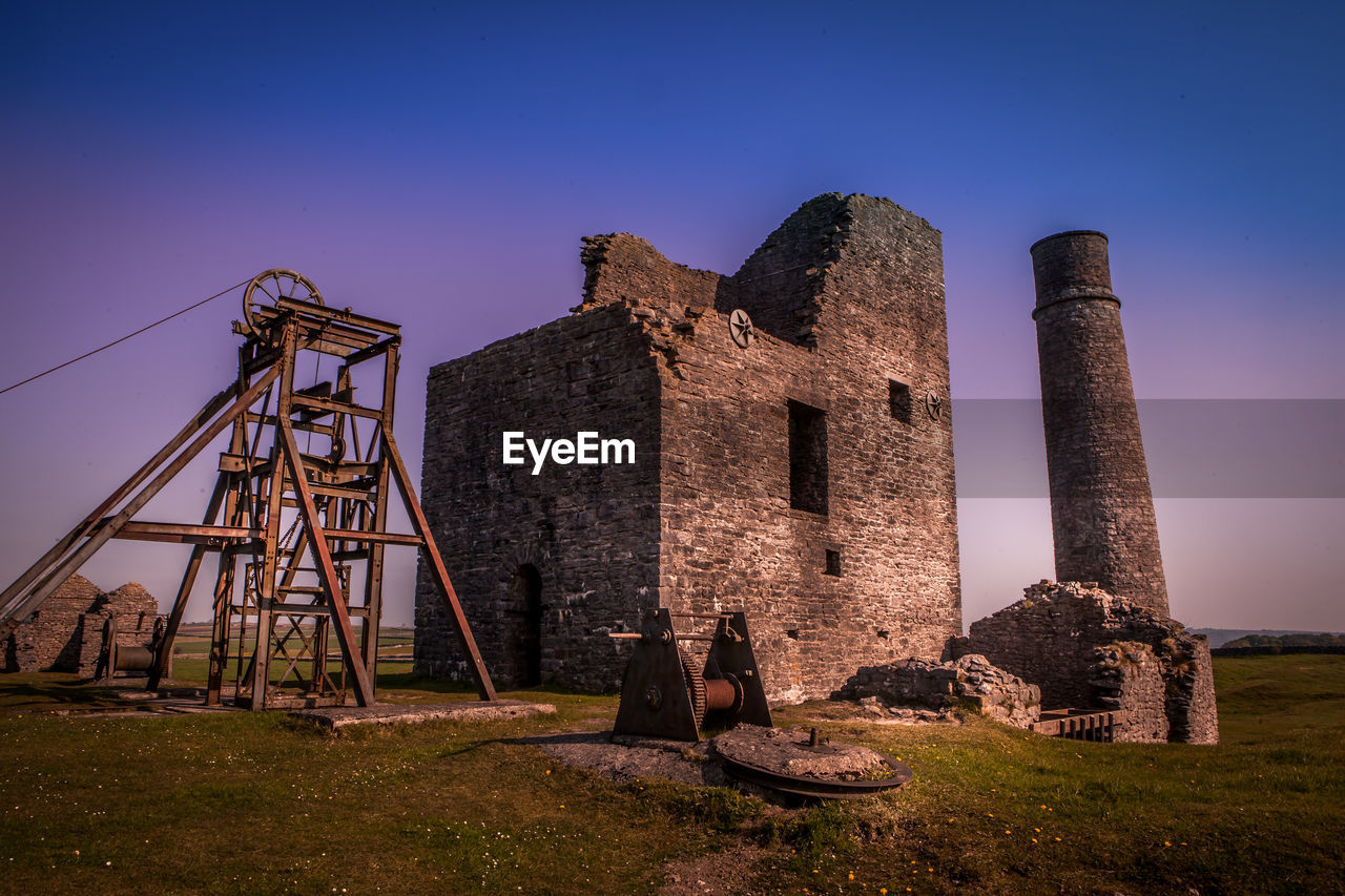 OLD RUIN OF BUILDING AGAINST BLUE SKY