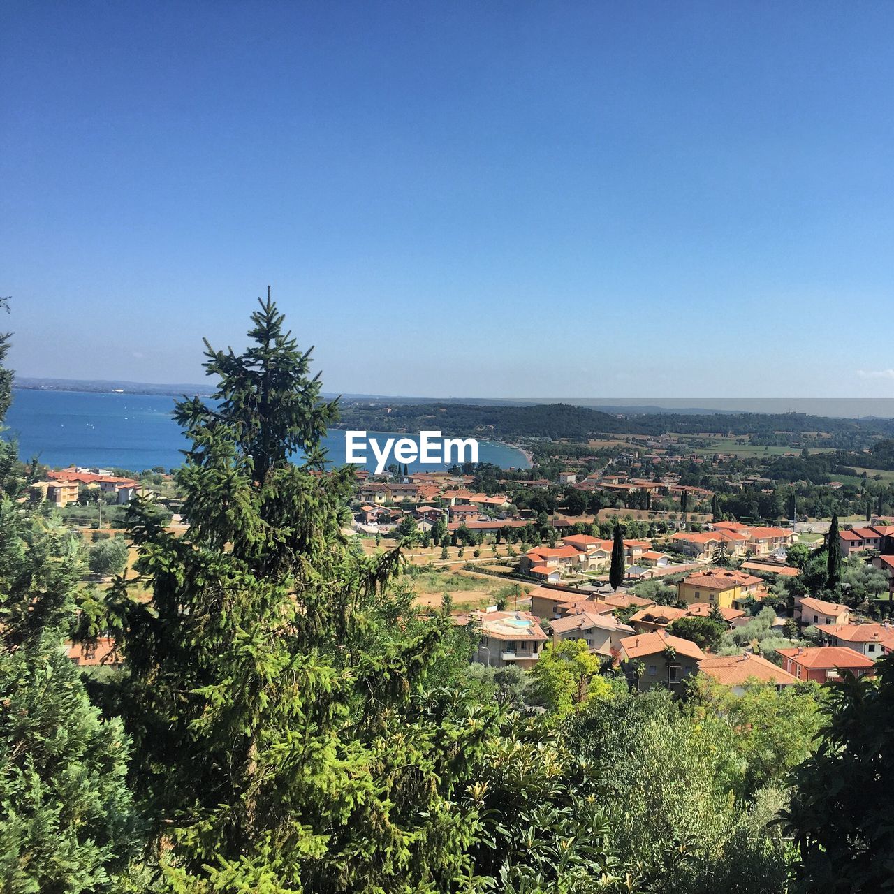 Scenic view of sea against clear blue sky