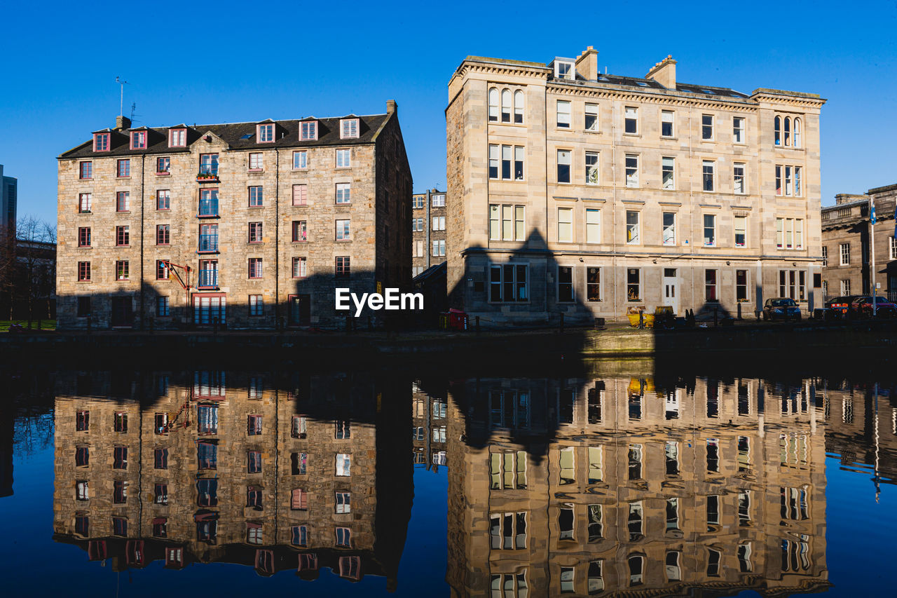 Warehouses and reflections in leith, edinburgh, scotland