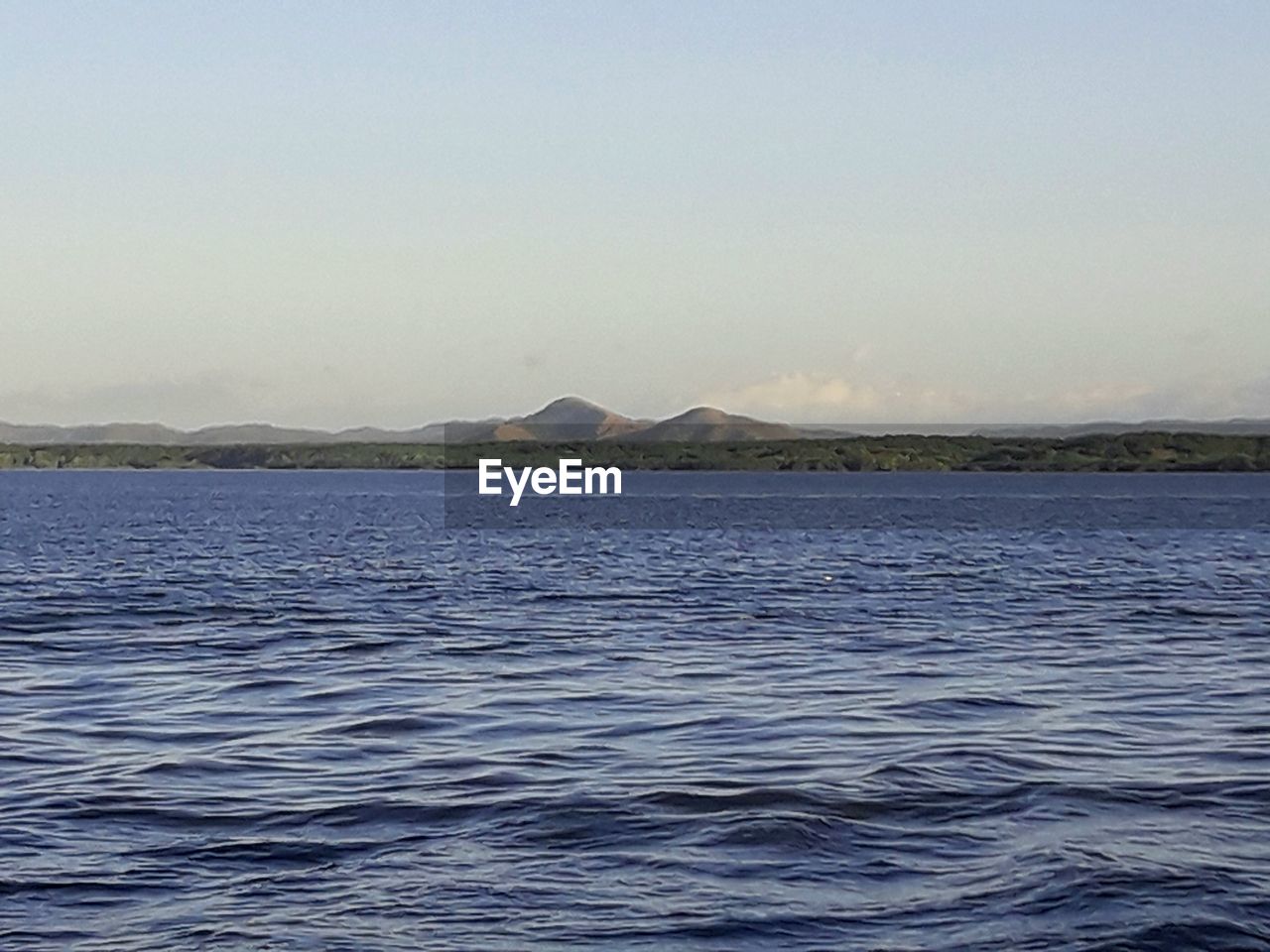 PANORAMIC VIEW OF SEA AGAINST CLEAR SKY