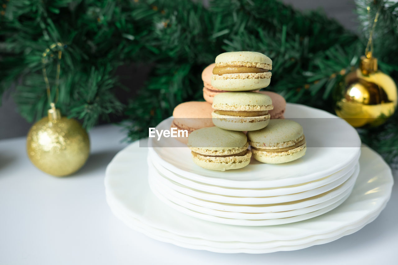 food and drink, food, sweet food, celebration, plate, baked, dessert, sweet, christmas tree, cake, meal, icing, decoration, no people, plant, holiday, table, freshness, tradition, cookie, temptation, event, indoors, christmas, nature, still life, breakfast, french food