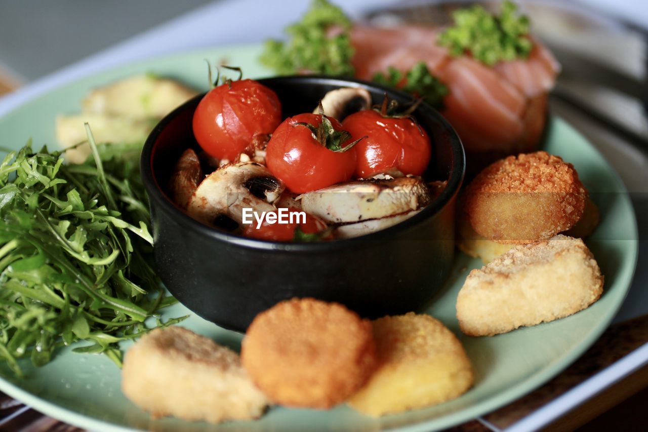 CLOSE-UP OF FRUITS SERVED IN PLATE