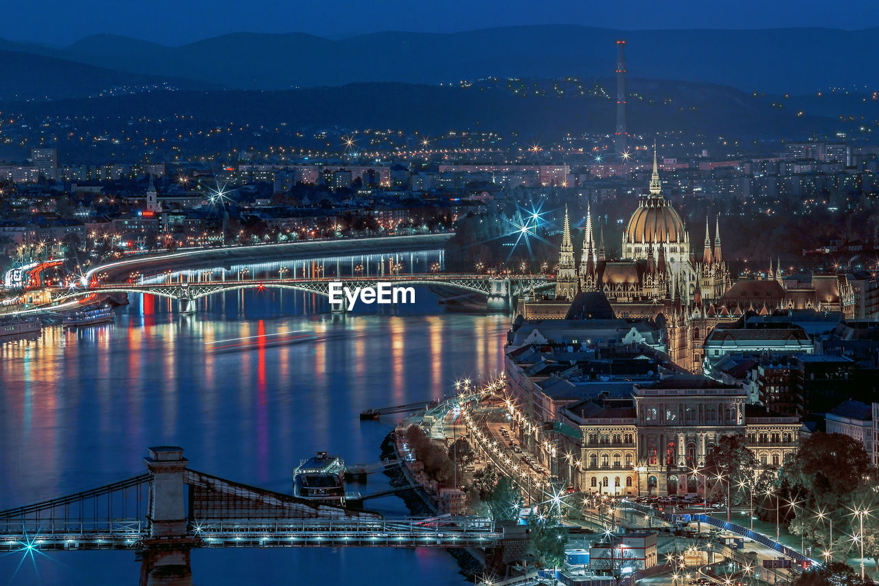 Budapest aerial night panorama over danube and parliament, hungary