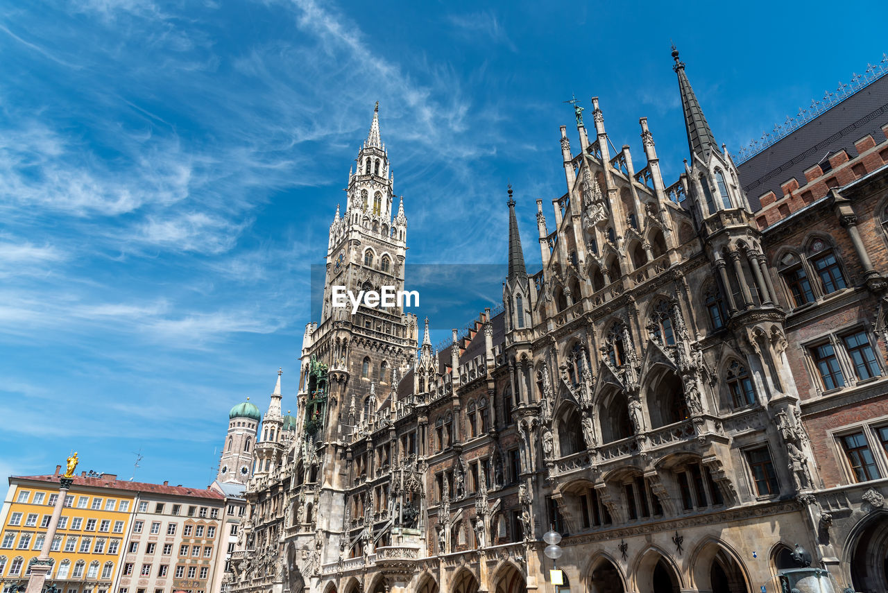 The townhall at the marienplatz in munich, germany, on a sunny day
