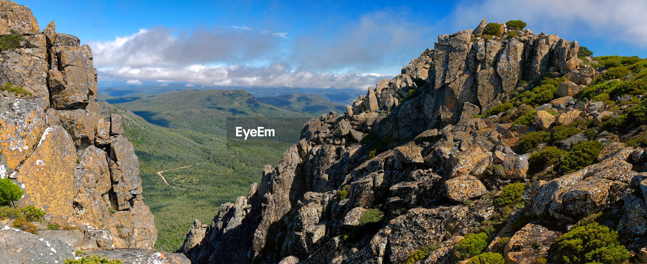 Scenic view through a gap in mountain range