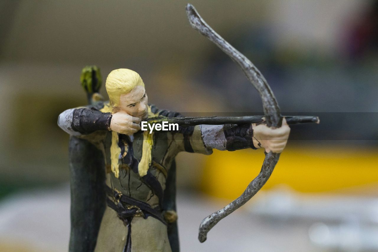 Close-up of archery figurine