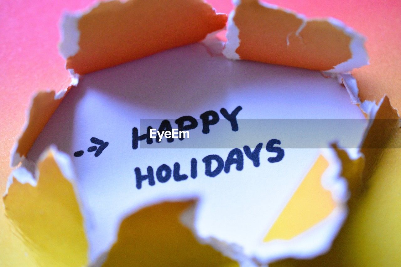 text, paper, communication, no people, close-up, western script, petal, indoors, yellow, pink, message