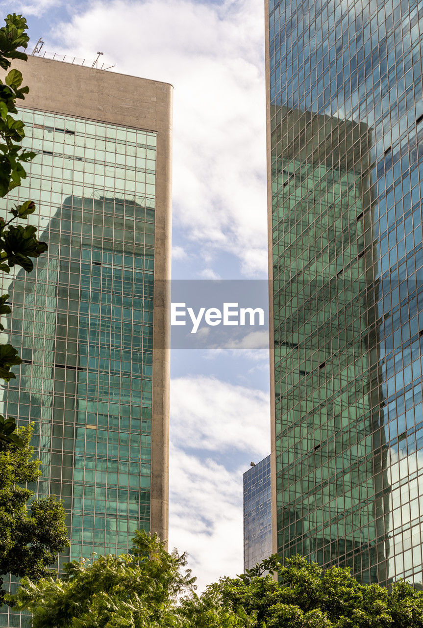 Low angle view of skyscrapers against sky