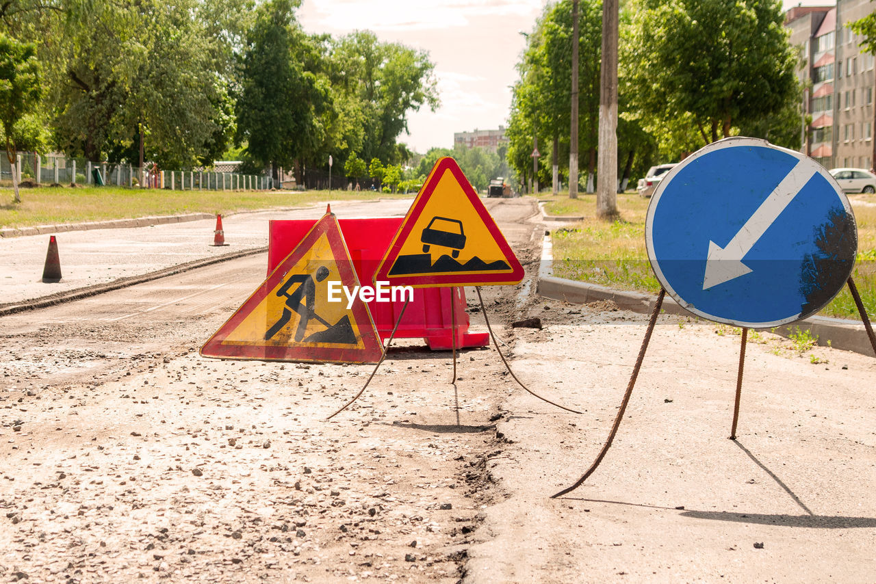 Various road sign against trees