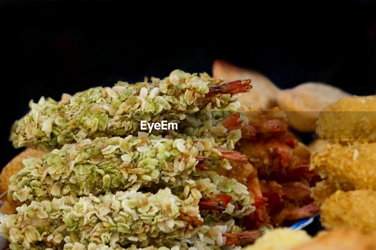 Close-up of seafood against black background