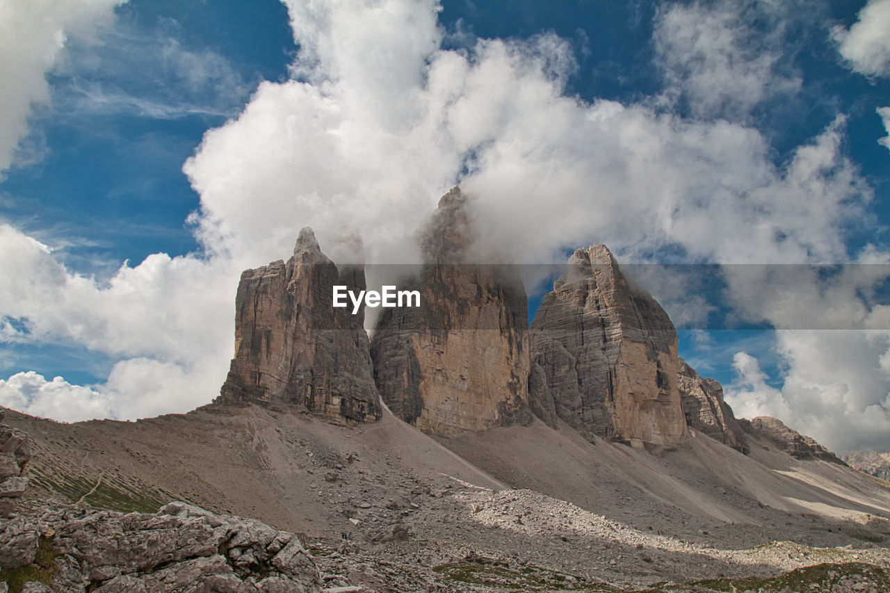 Panoramic view of dolomites against sky