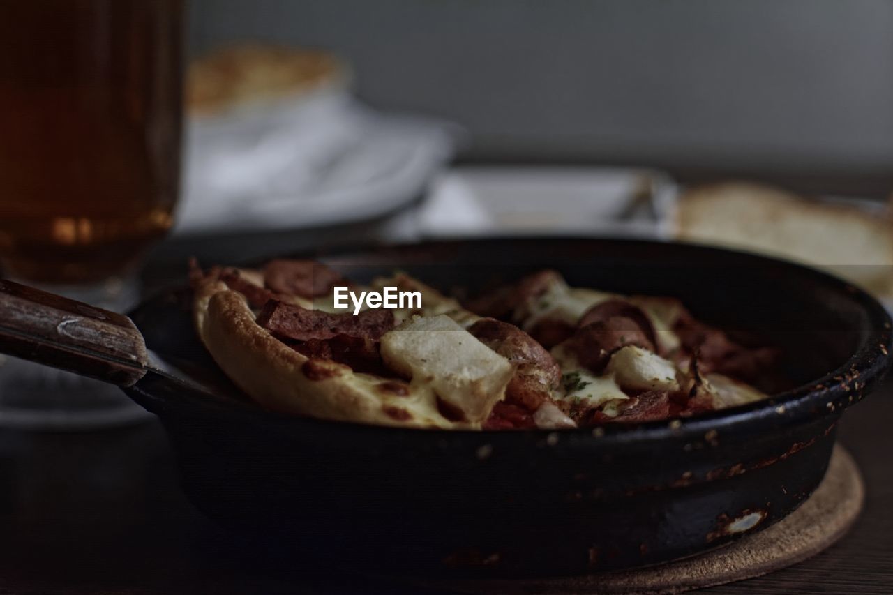 Close-up of food in pan on table