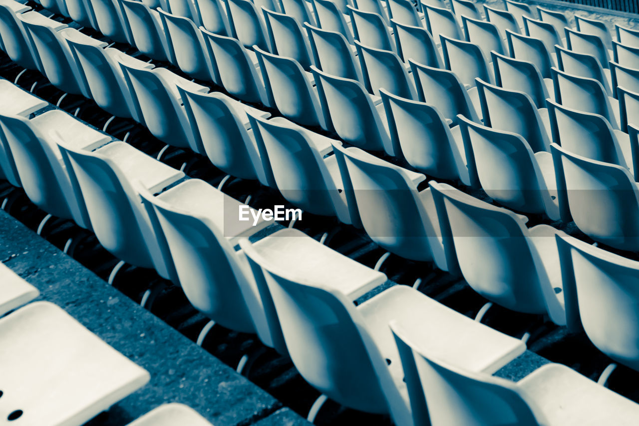 High angle view of empty chairs in movie theater