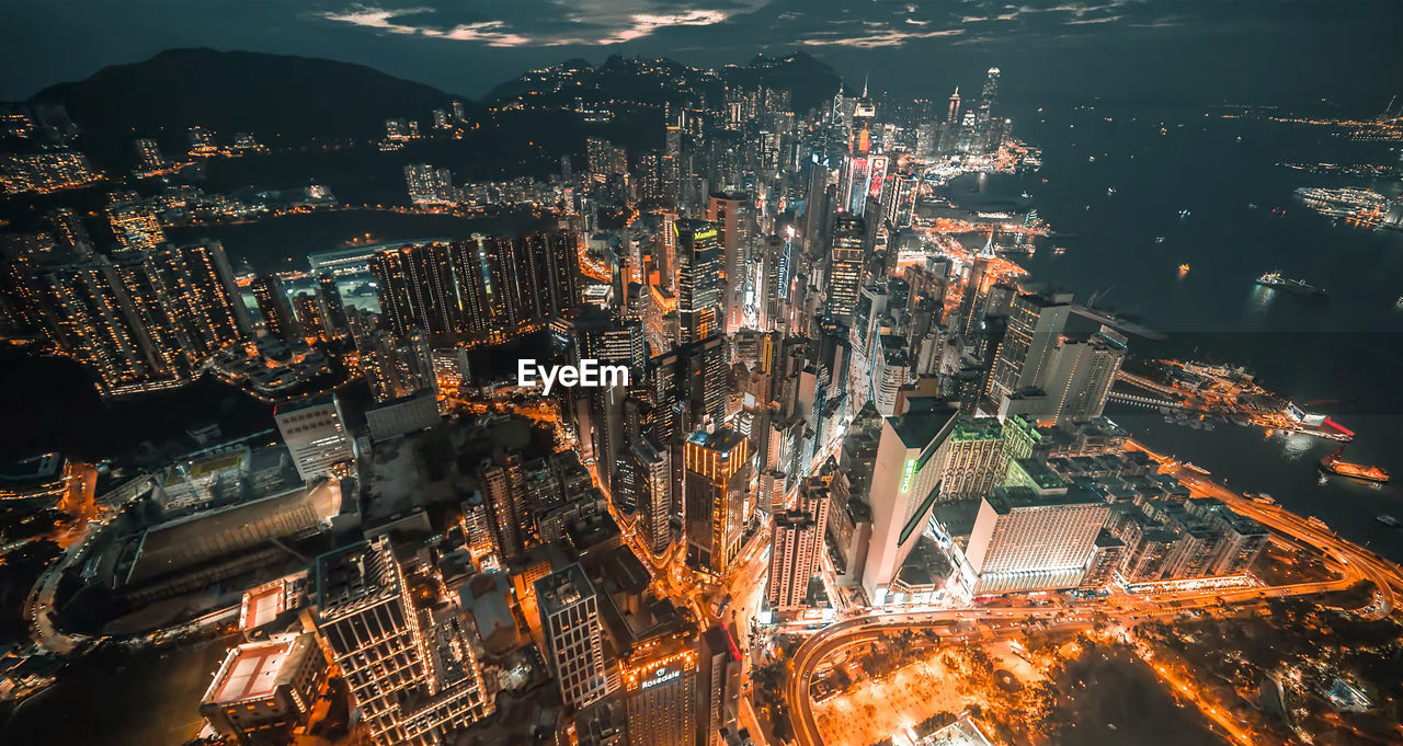 High angle view of illuminated buildings at night