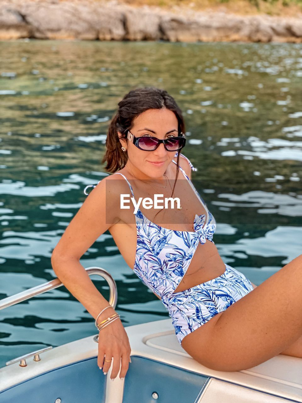 Portrait of young woman in swimming pool