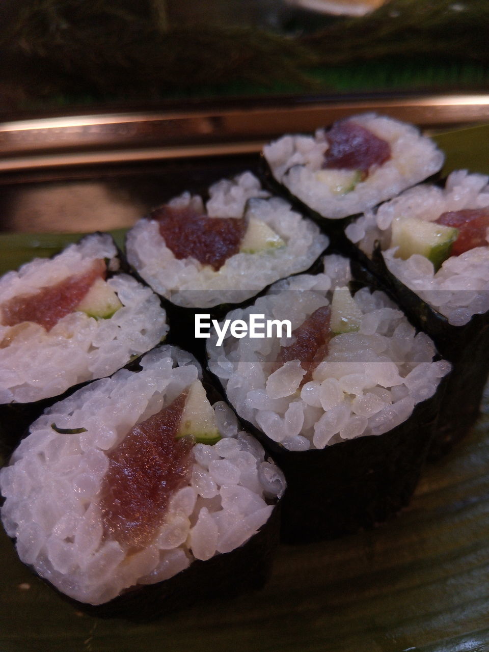 CLOSE-UP OF SUSHI SERVED ON PLATE