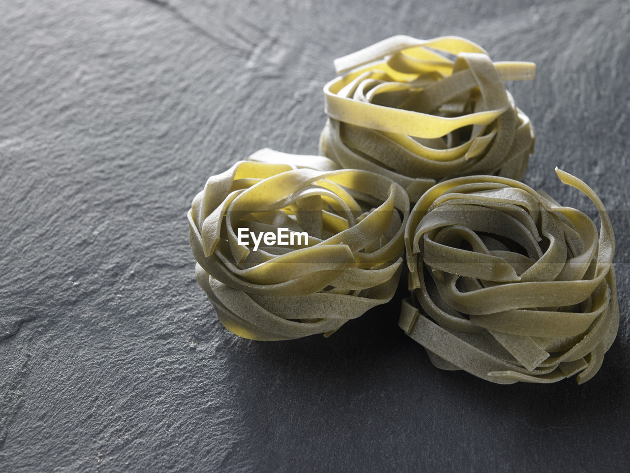 Close-up of pasta on slate