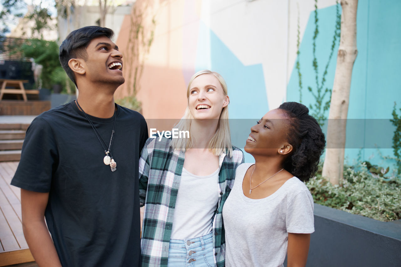 Cheerful friends enjoying outdoors