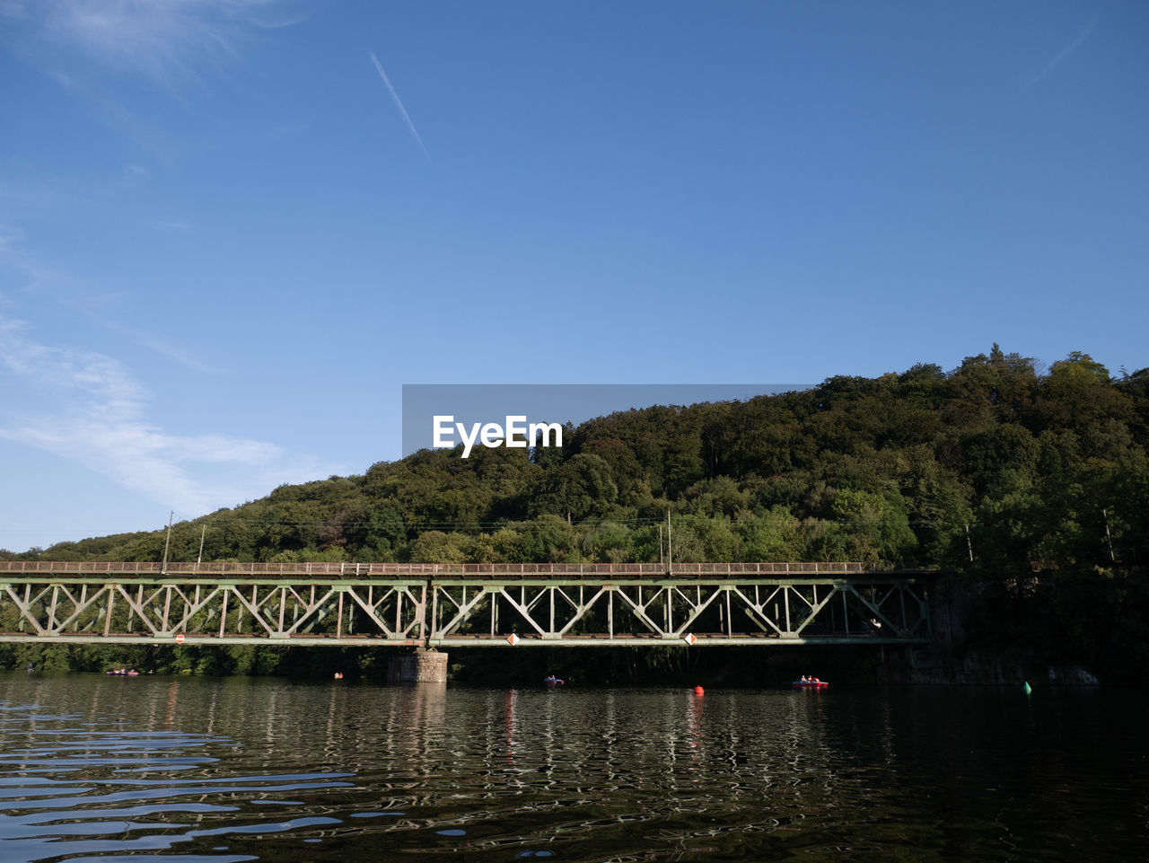 ARCH BRIDGE OVER RIVER AGAINST SKY