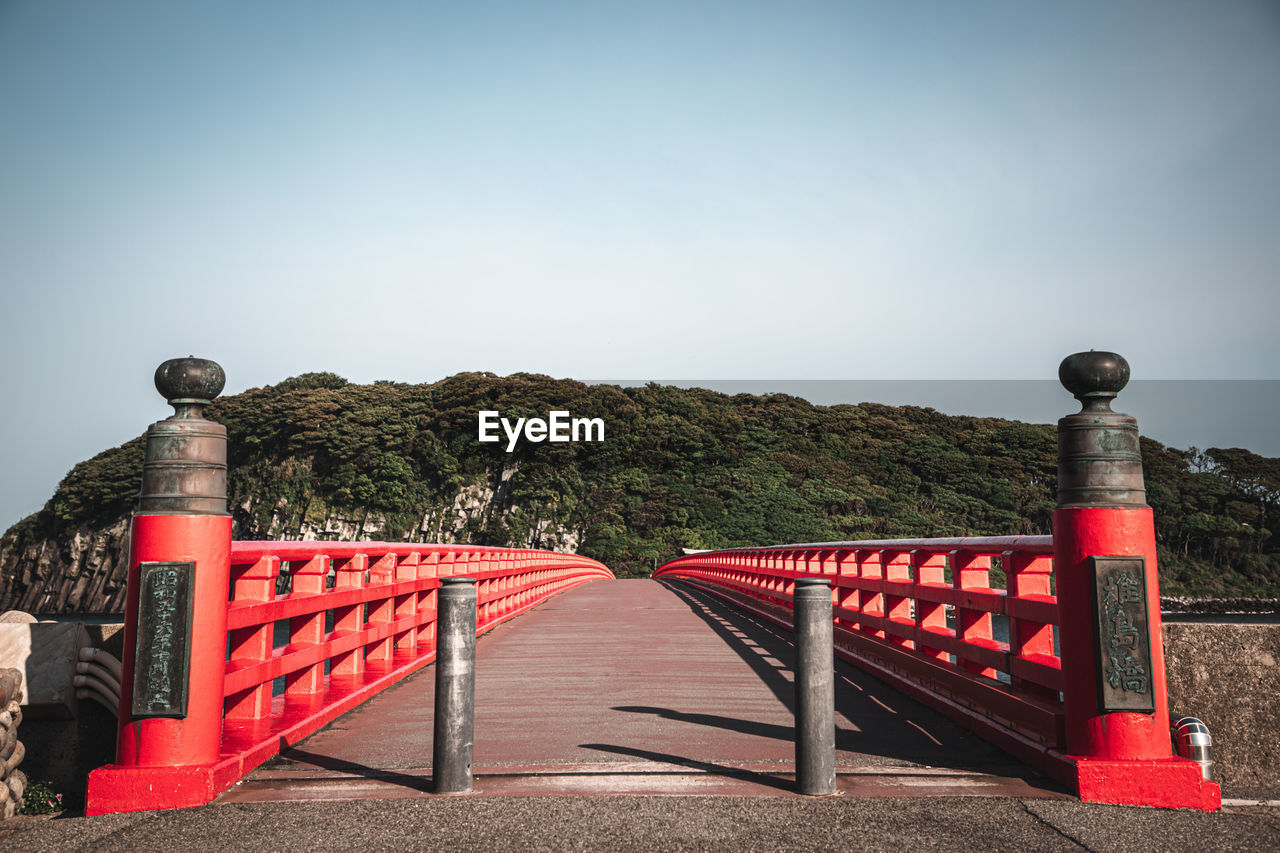 red, sky, nature, architecture, no people, security, protection, railing, clear sky, outdoors, day, built structure, plant, travel destinations, gate, copy space