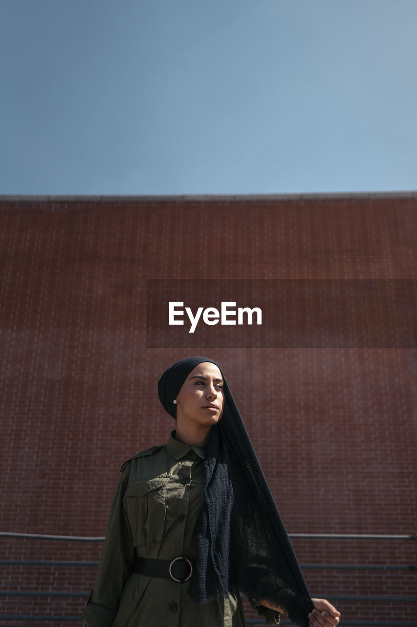 Portrait of modern muslim woman outdoors