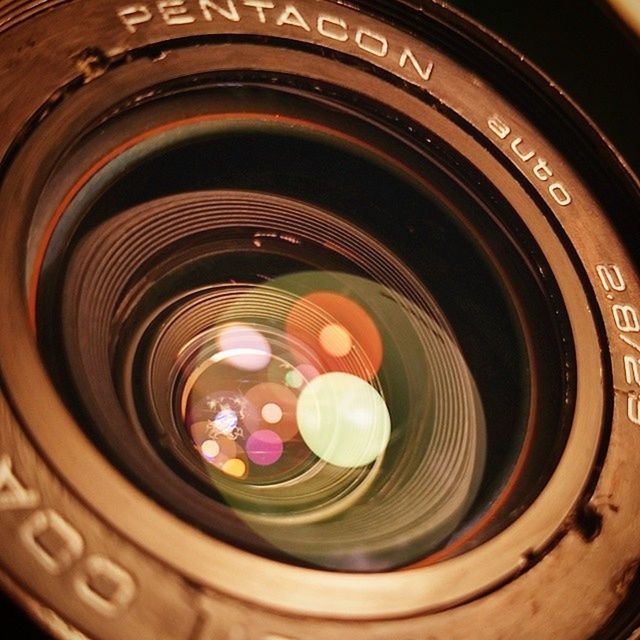 CLOSE-UP OF CAMERA ON TABLE