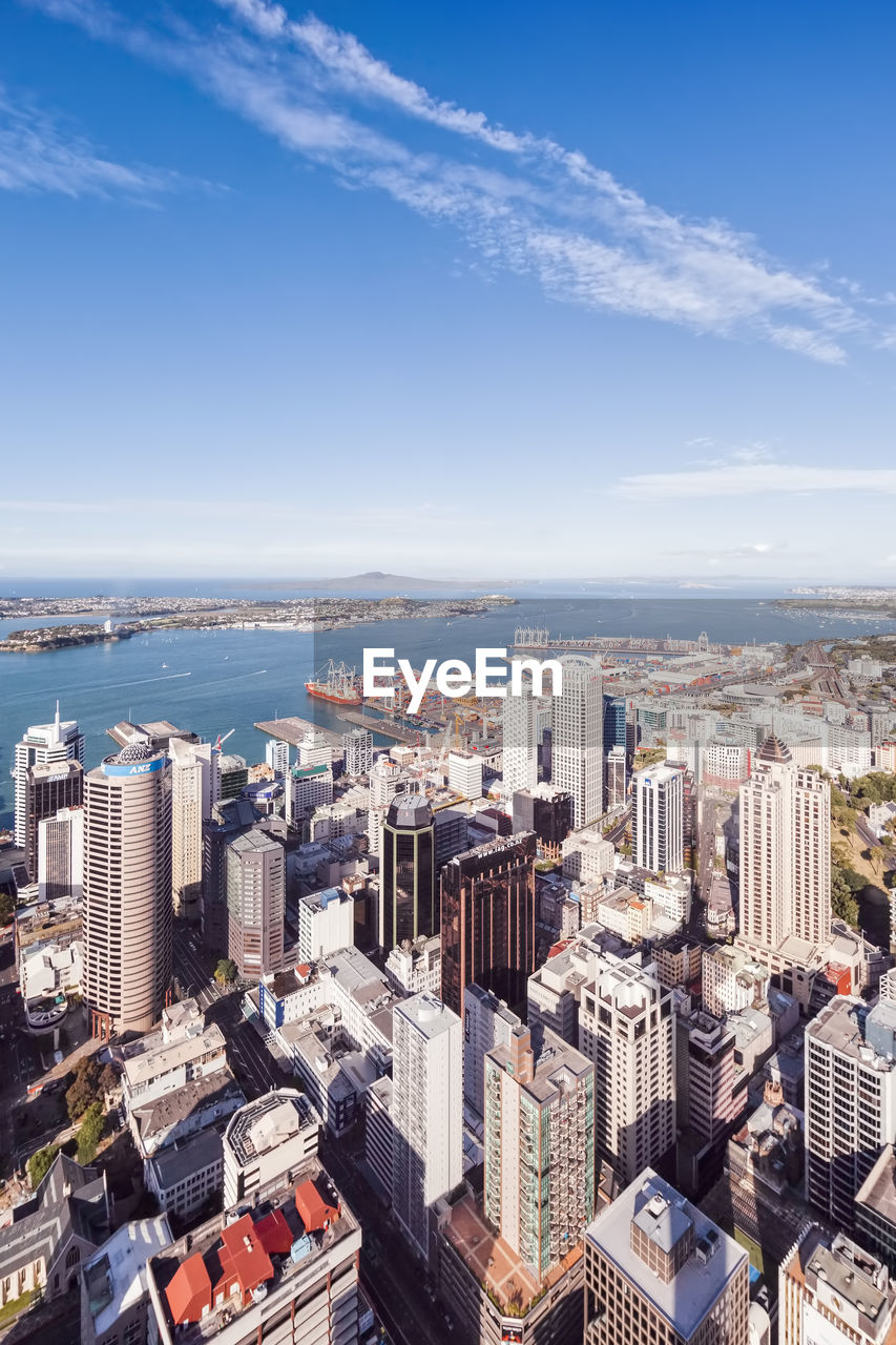 Aerial view of buildings against sky in city