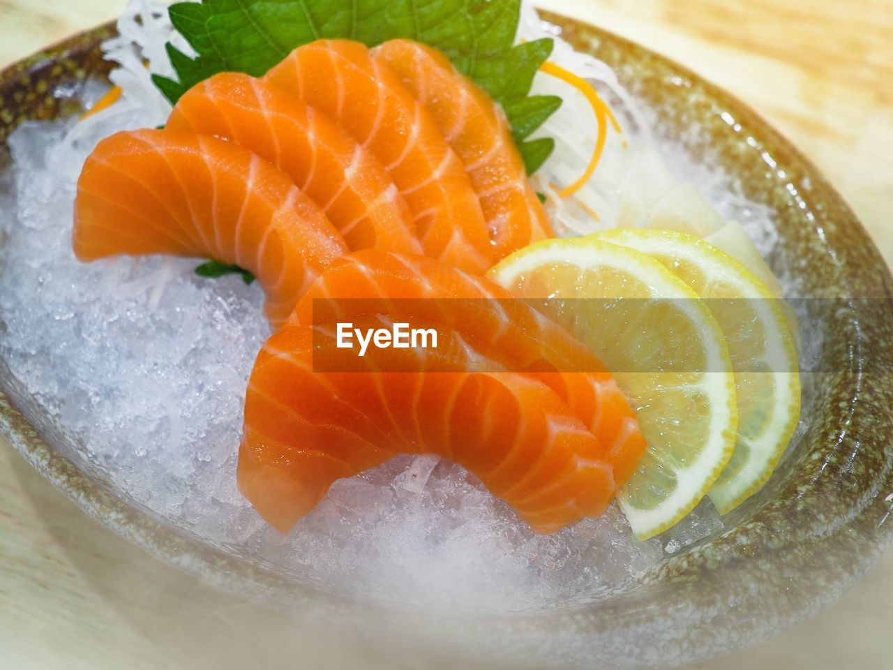CLOSE-UP OF FISH IN PLATE