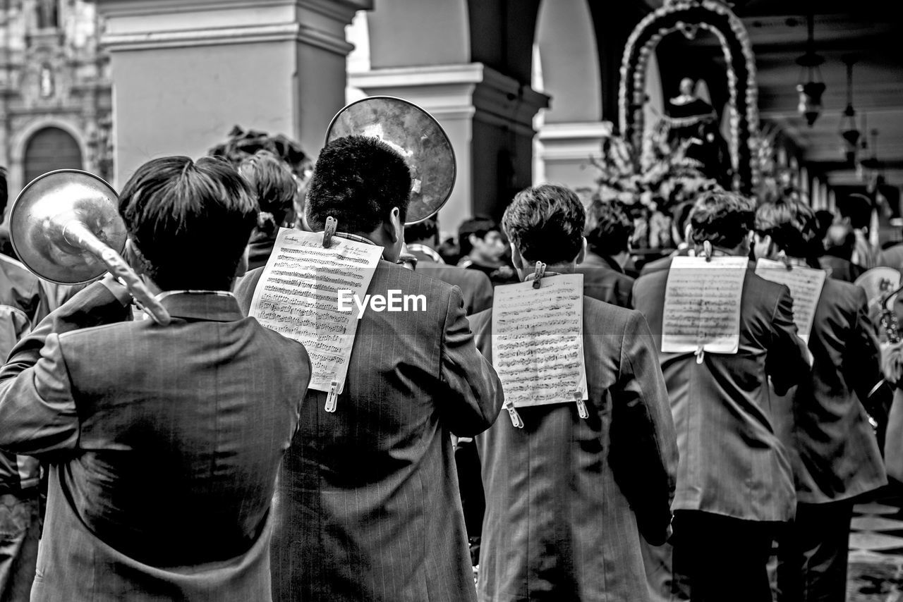 Marching band in building corridor