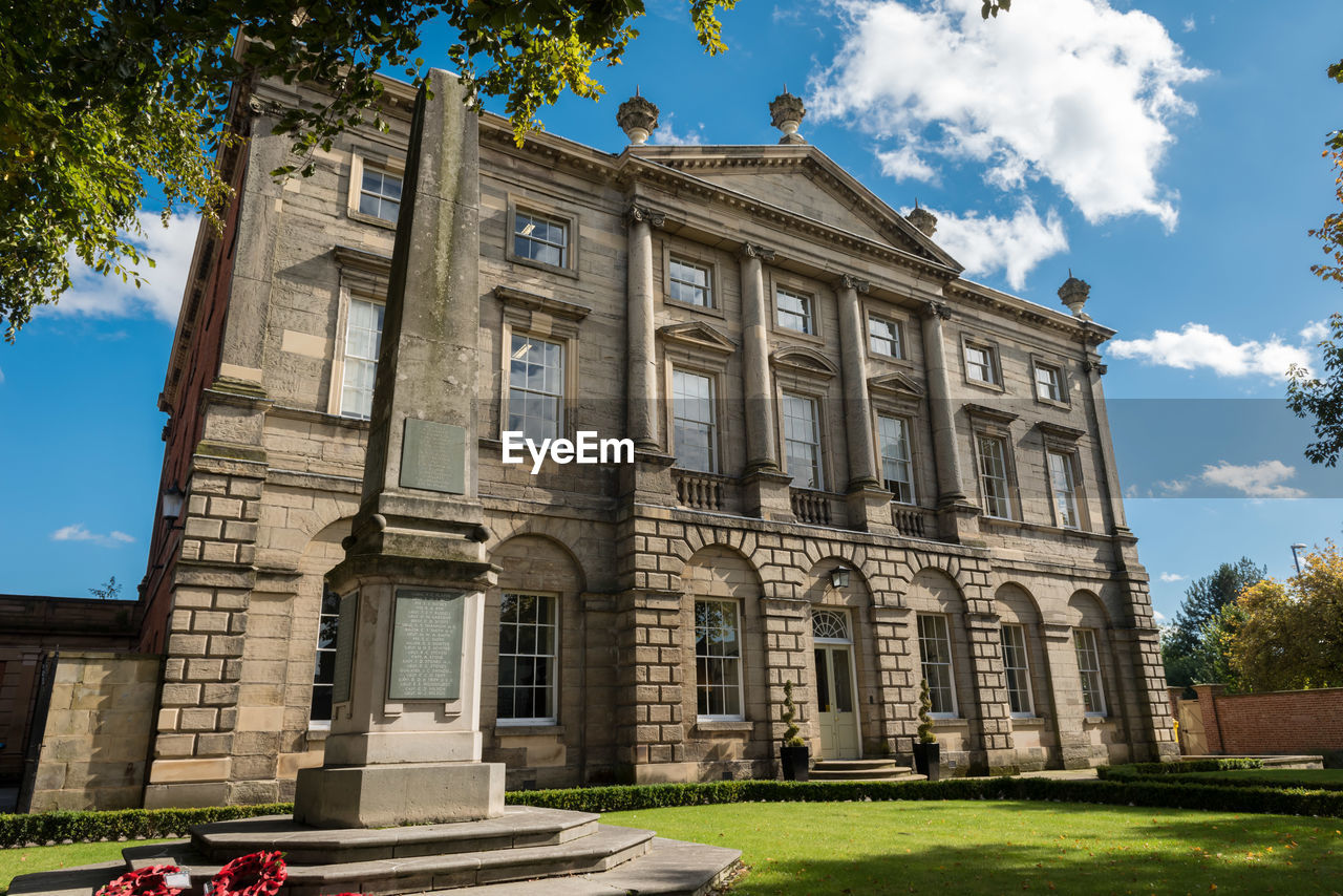 EXTERIOR OF HISTORIC BUILDING AGAINST SKY