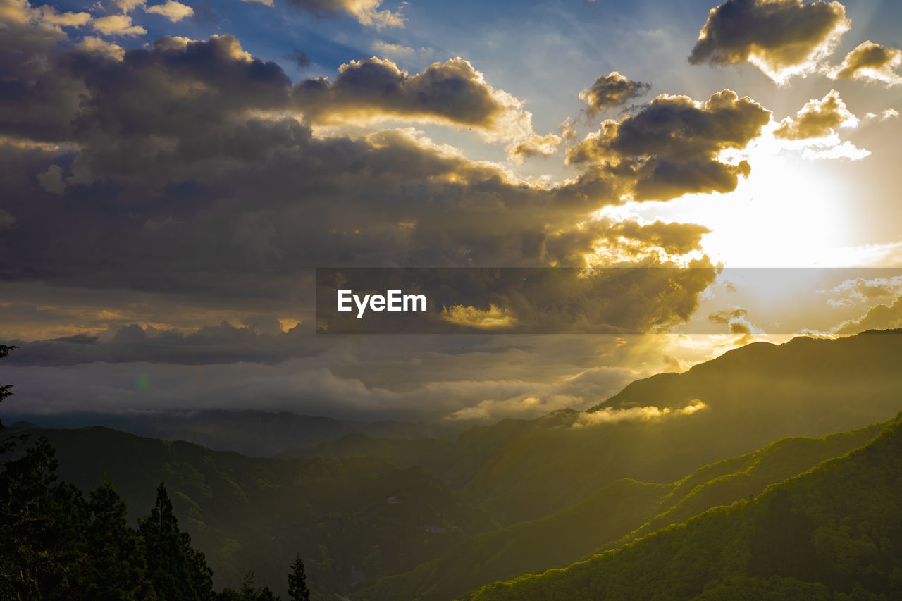 Low angle view of dramatic sky during sunset