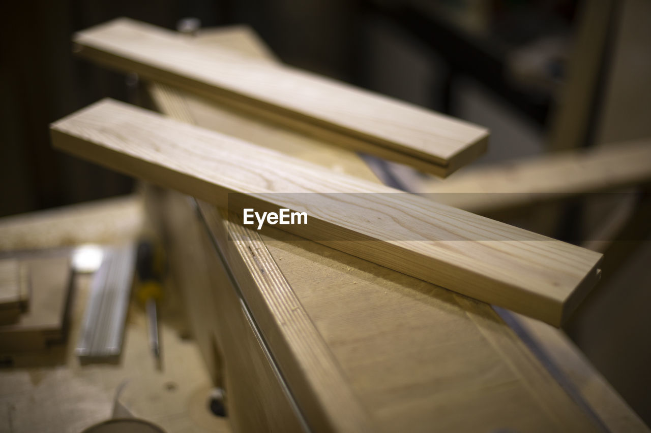 indoors, wood, art, close-up, selective focus, no people, industry, workshop, business, factory, focus on foreground, furniture