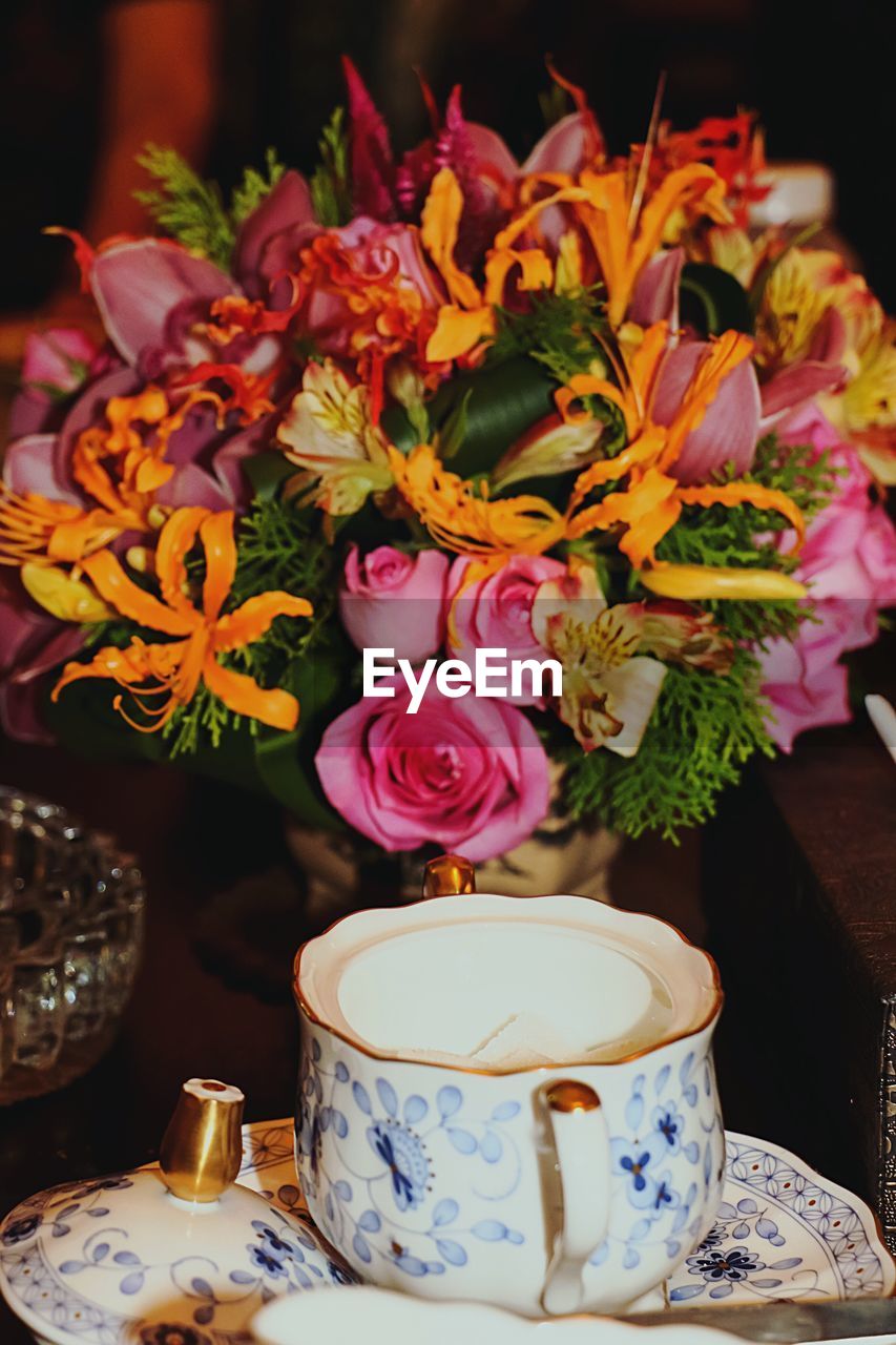 Close-up of flowers in vase on table