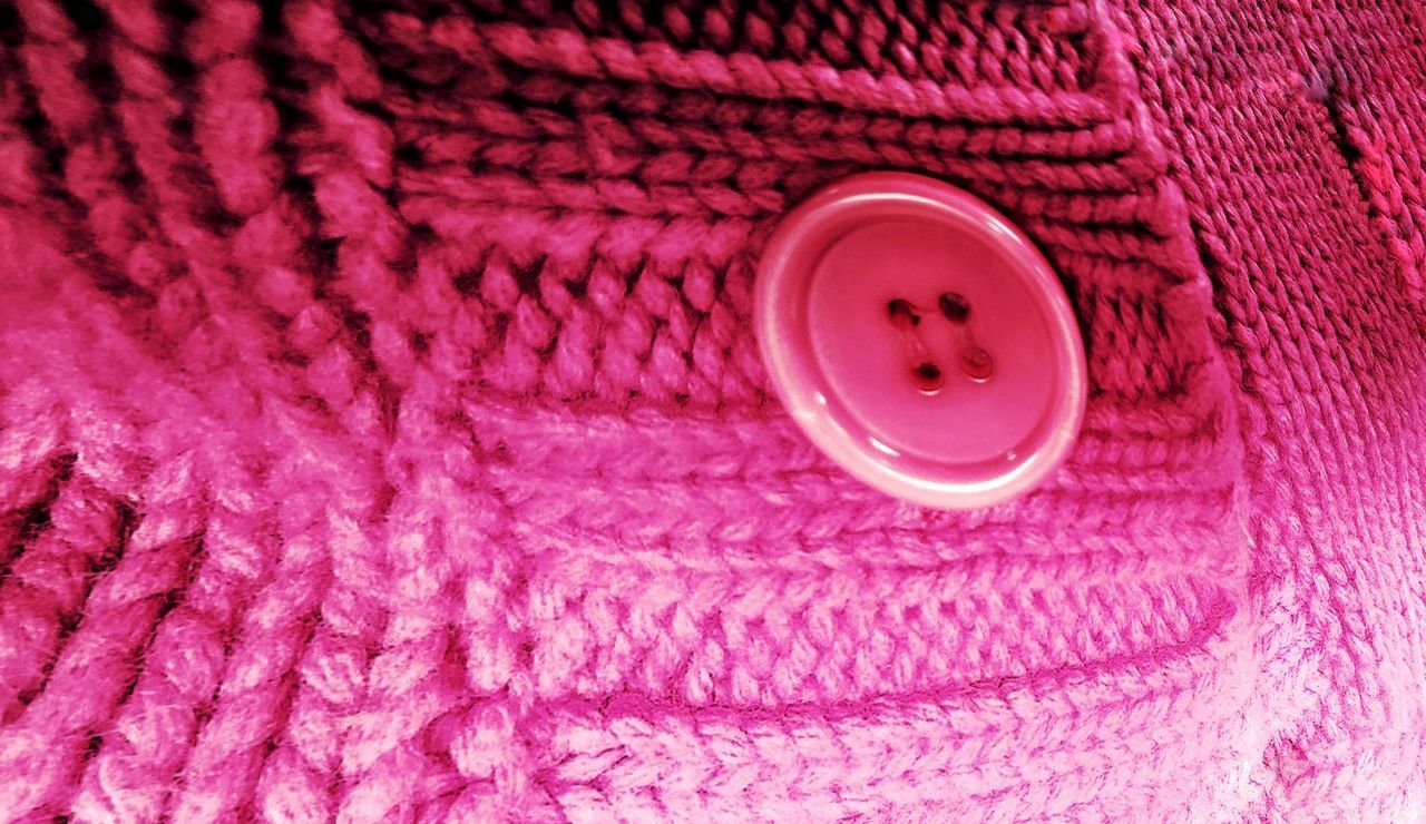 CLOSE-UP OF PINK FABRIC