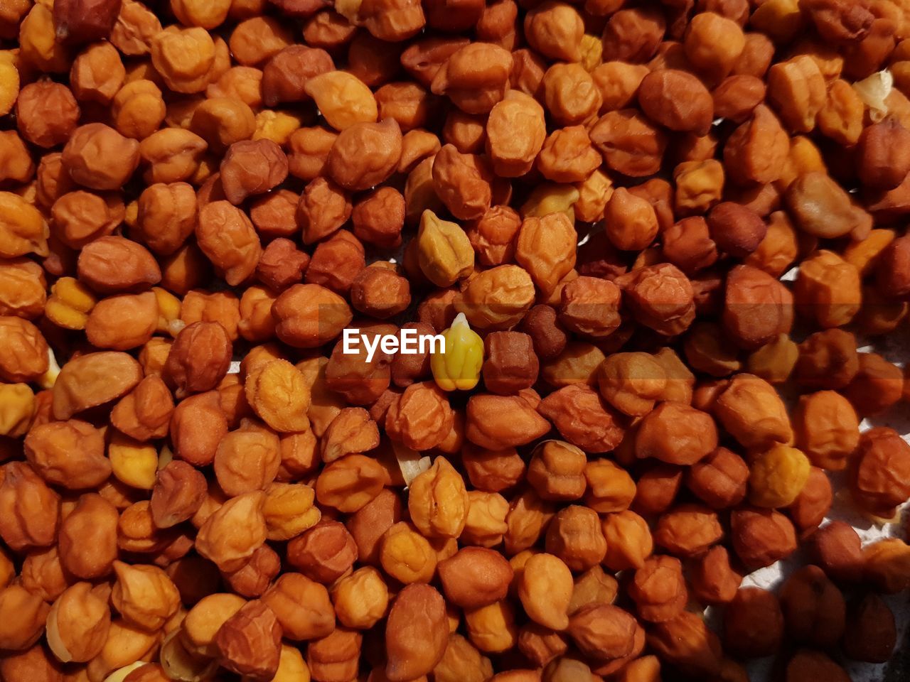 FULL FRAME SHOT OF COFFEE BEANS IN CONTAINER