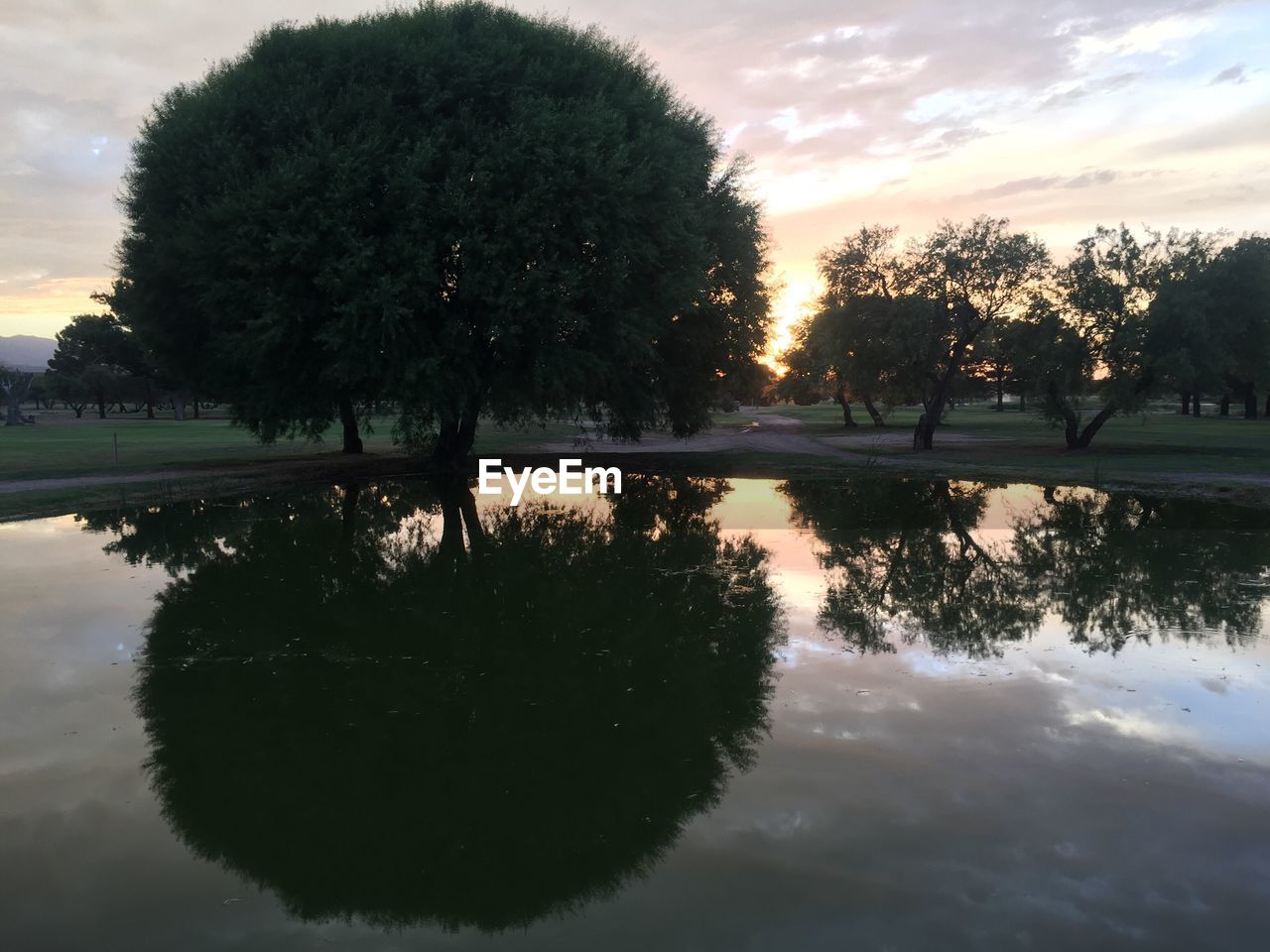 SUNSET OVER LAKE