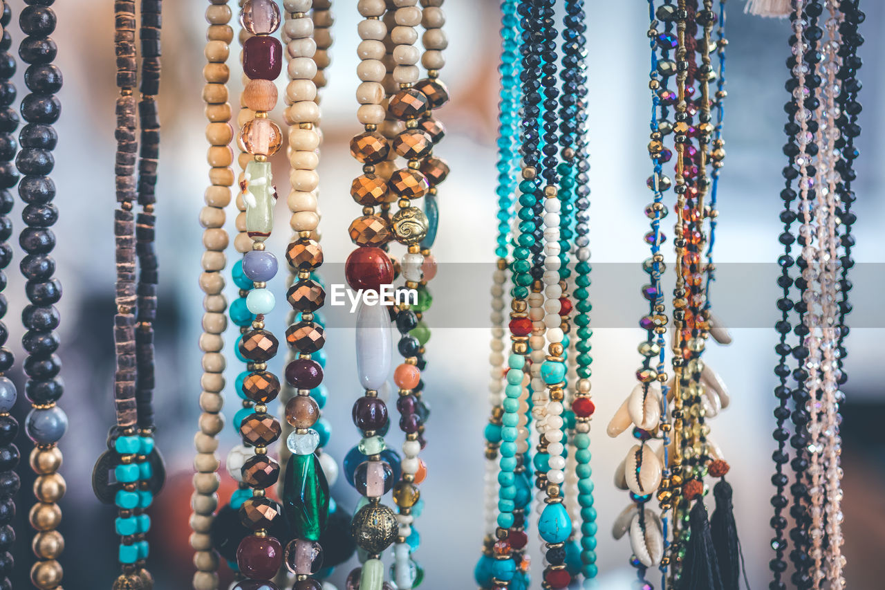 Close-up of bead necklace for sale at market