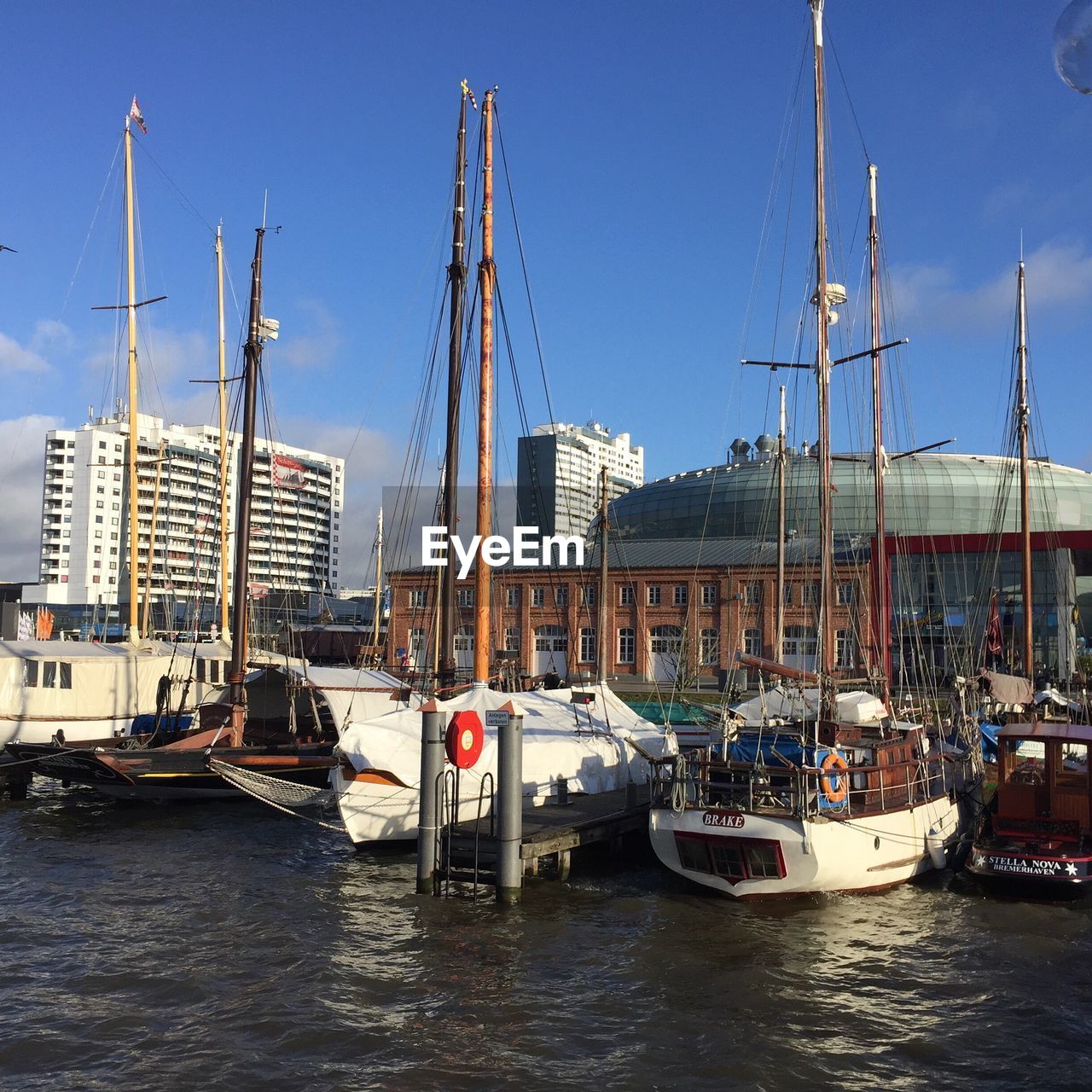 Boats moored at harbor