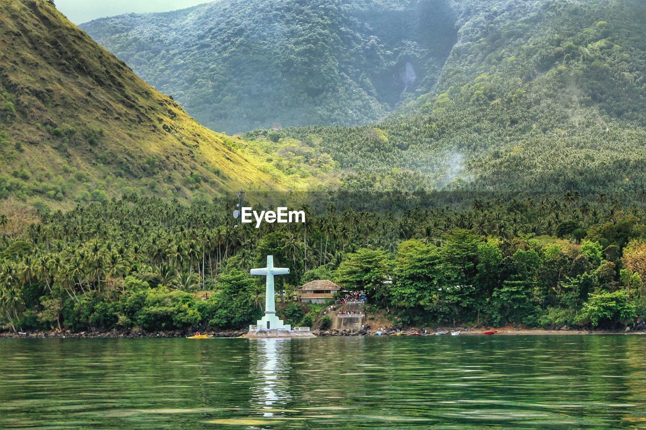 View of lake with trees in the background