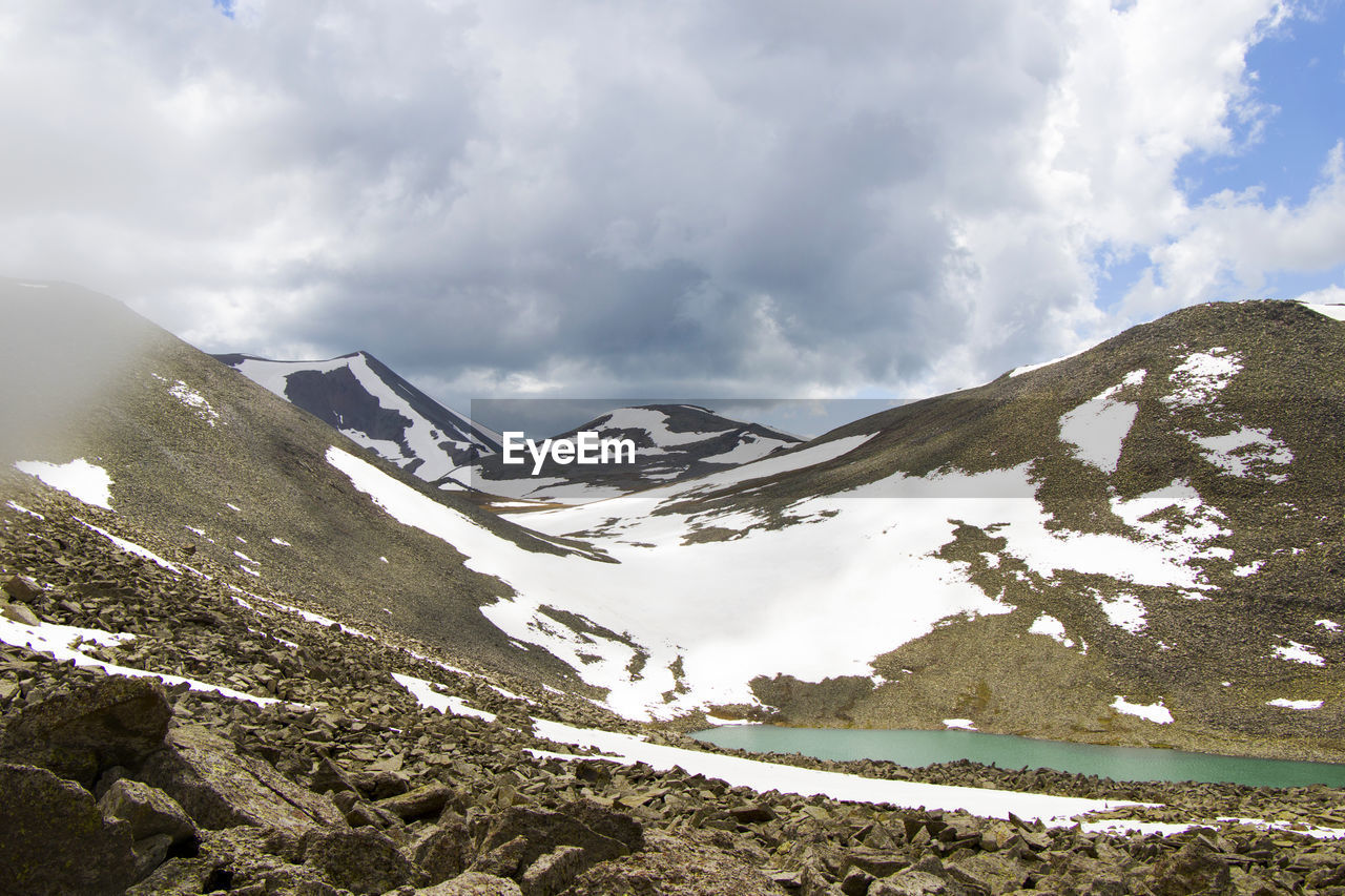 Alpine mountain lake landscape, colorful nature view, georgian lake, travel destination