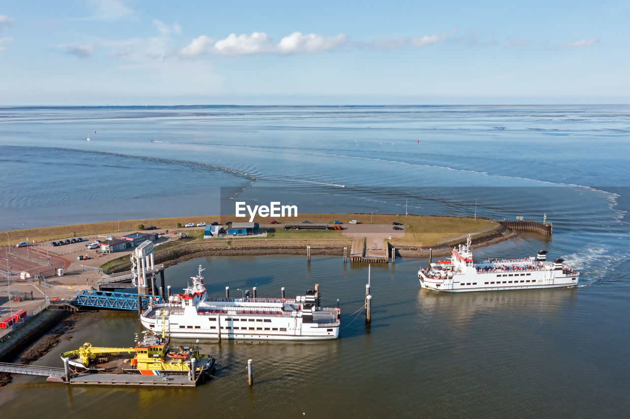 Aerial from the ferry from schiermonnikoog arriving in the harbor from lauwersoog in the netherlands