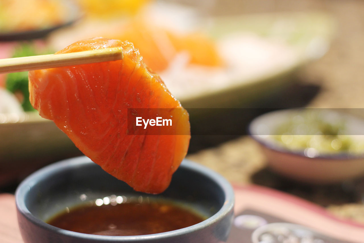 CLOSE-UP OF SUSHI IN PLATE