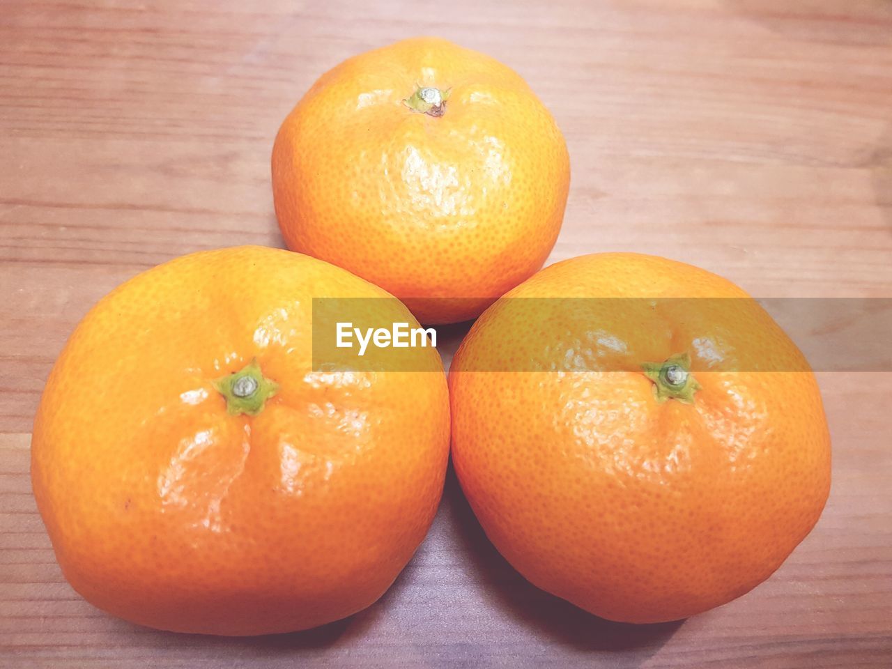 High angle view of orange fruits on table