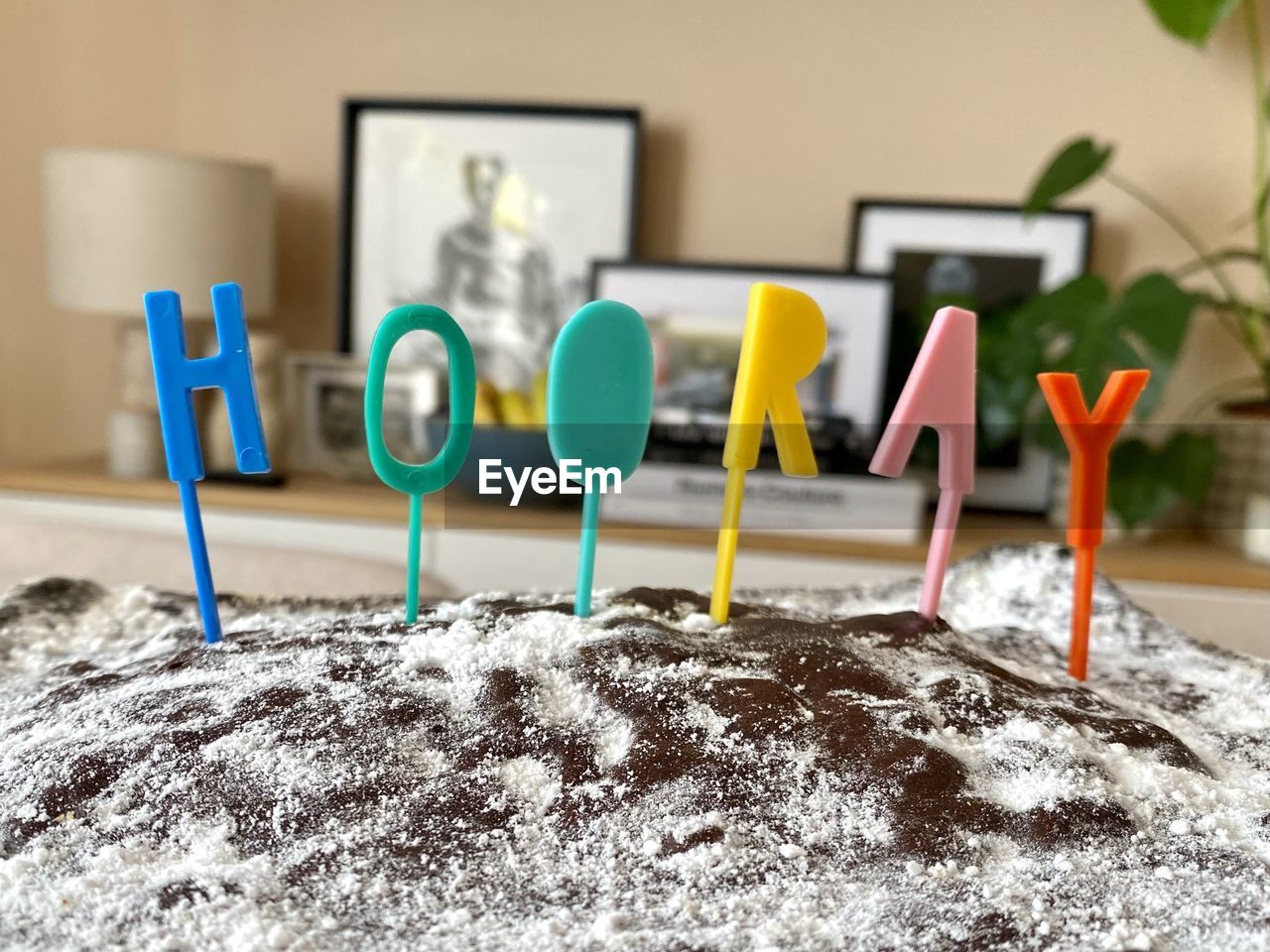 Chocolate birthday cake on table