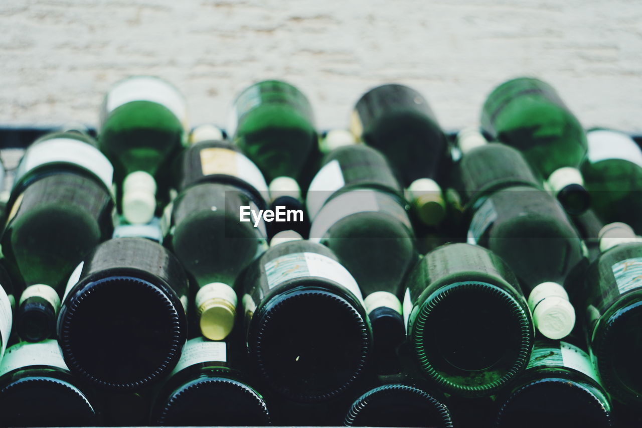 Full frame shot of wine bottles for sale in store