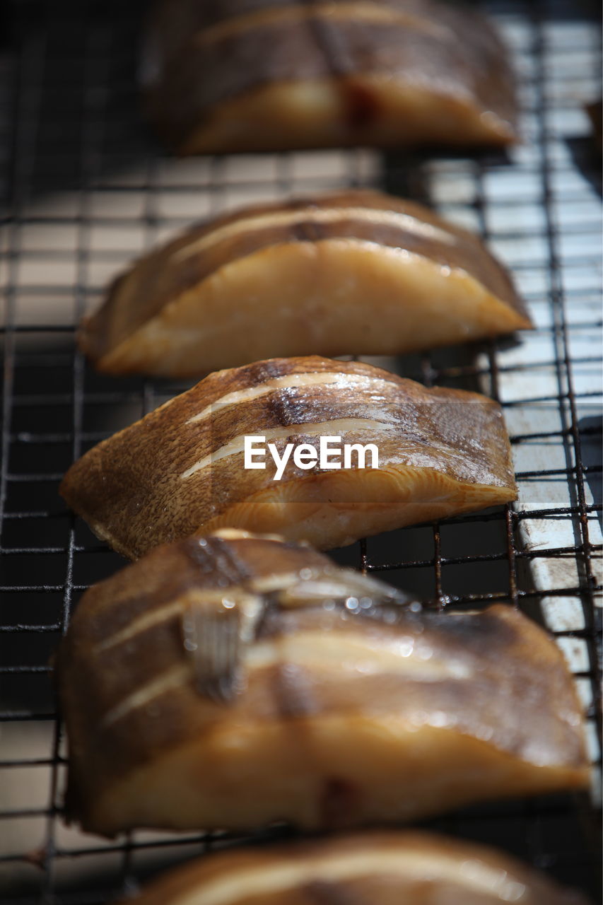 Close-up of fish grilled on barbecue